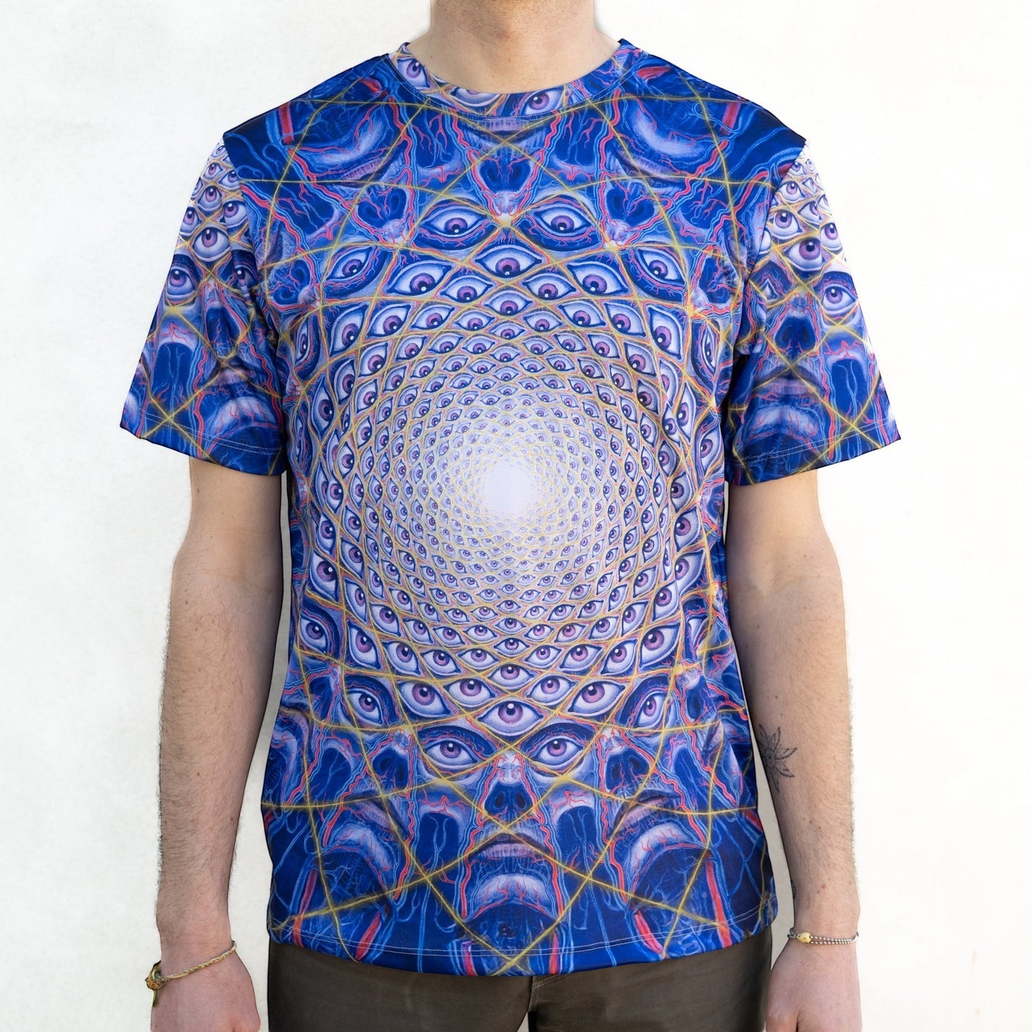 CoSM Shop blue all-over print dye-sub t-shirt with a psychedelic eye pattern. 100% polyester.