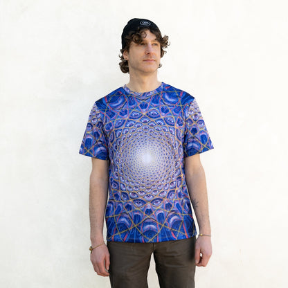 CoSM Shop blue all-over print dye-sub t-shirt with a mandala eye design, made of moisture-wicking polyester.
