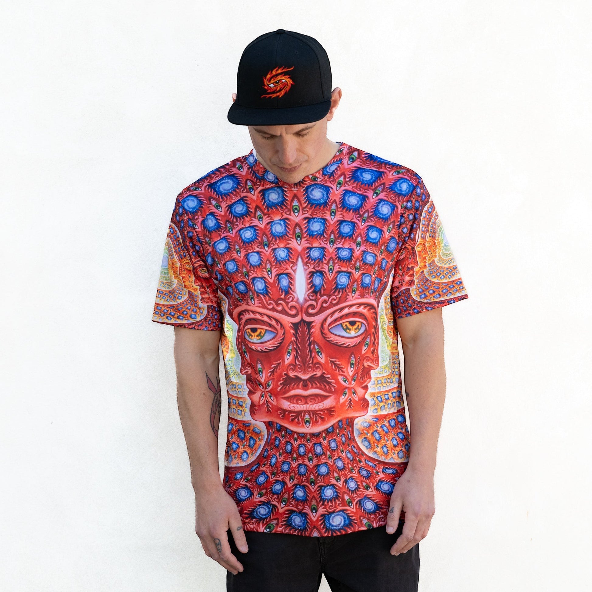 CoSM Shop men's red, blue, and orange all-over print dye-sublimation polyester t-shirt with a face graphic.