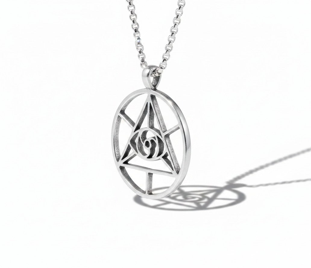 CoSM Shop sterling silver Eye of Spirit pendant with intricate geometric design and chain.