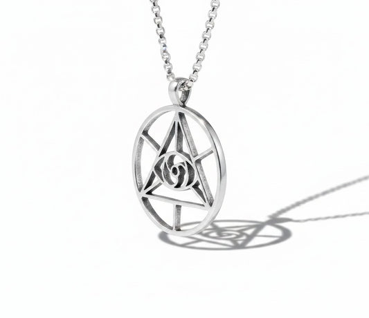 CoSM Shop sterling silver Eye of Spirit pendant with intricate geometric design and chain.