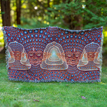 CoSM Shop Net of Being XL art blanket by Alex Grey, featuring intricate faces and cosmic patterns in red, blue, and orange. Made from 100% recycled cotton.