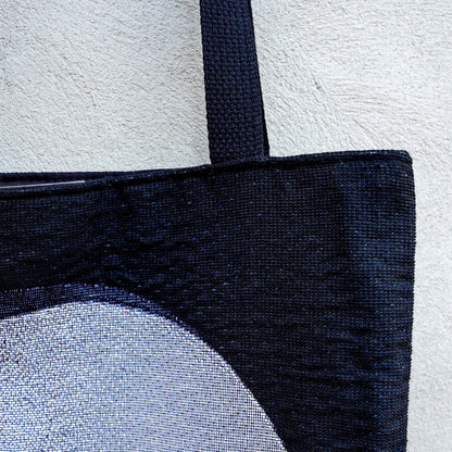 CoSM Shop Polar Unity Spiral woven tote bag with black canvas interior and strap, featuring Alex Grey artwork.
