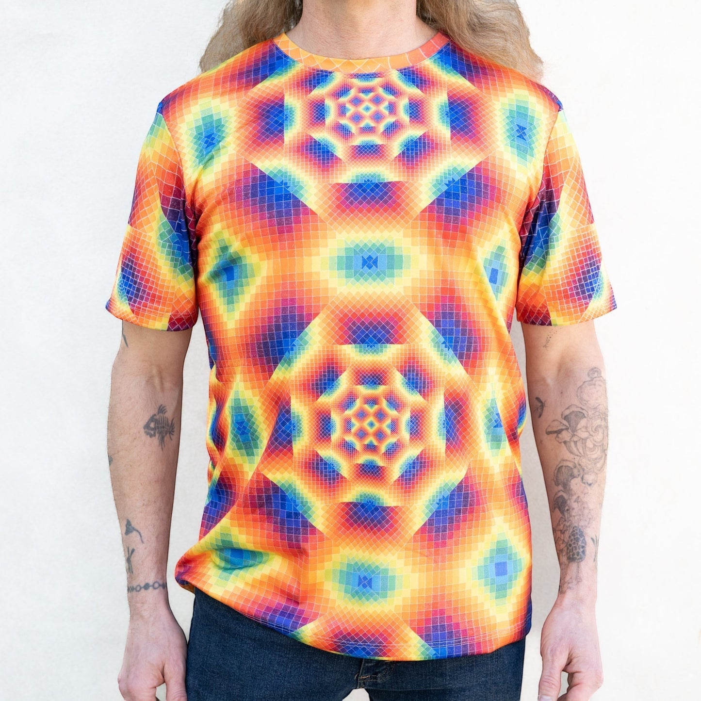 CoSM Shop men's short-sleeve t-shirt with a vibrant, all-over rainbow geometric fractal print. Made of moisture-wicking polyester.
