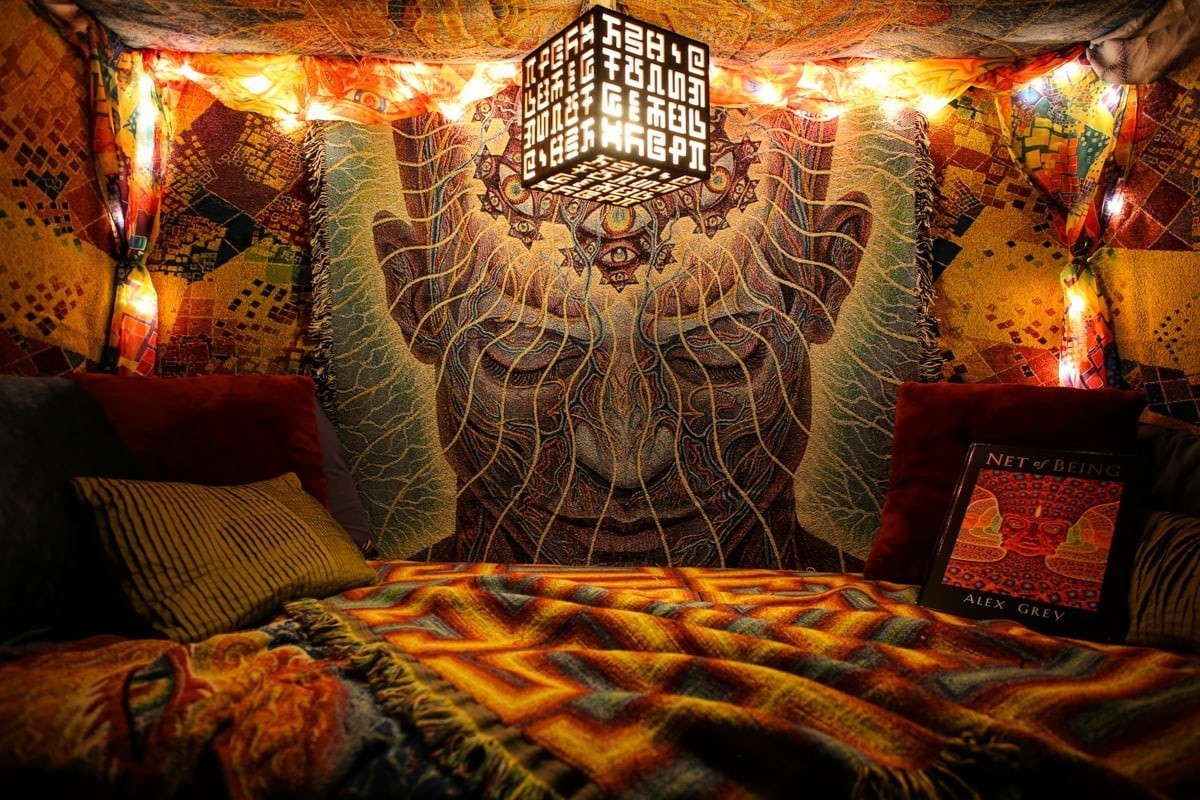 CoSM Shop Secret Writing hanging lamp made of laser-cut birch wood with intricate geometric patterns and text.