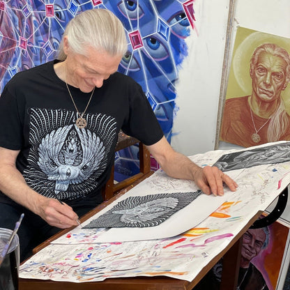 CoSM Shop black 100% cotton short sleeve tee with Alex Grey's Solstice Angel artwork printed on the front.