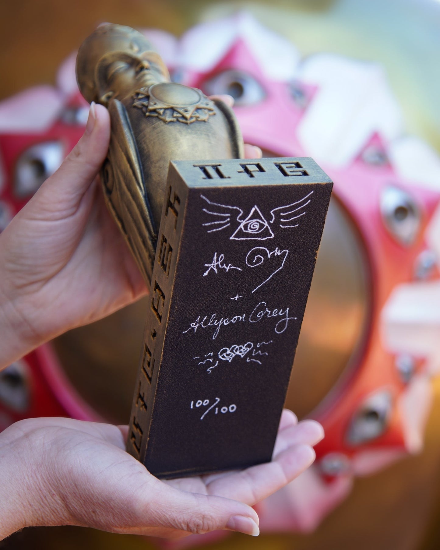 CoSM Shop Soulbird sculpture, hand-painted gold finish, featuring Alex & Allyson Grey's signatures and edition 100/100.