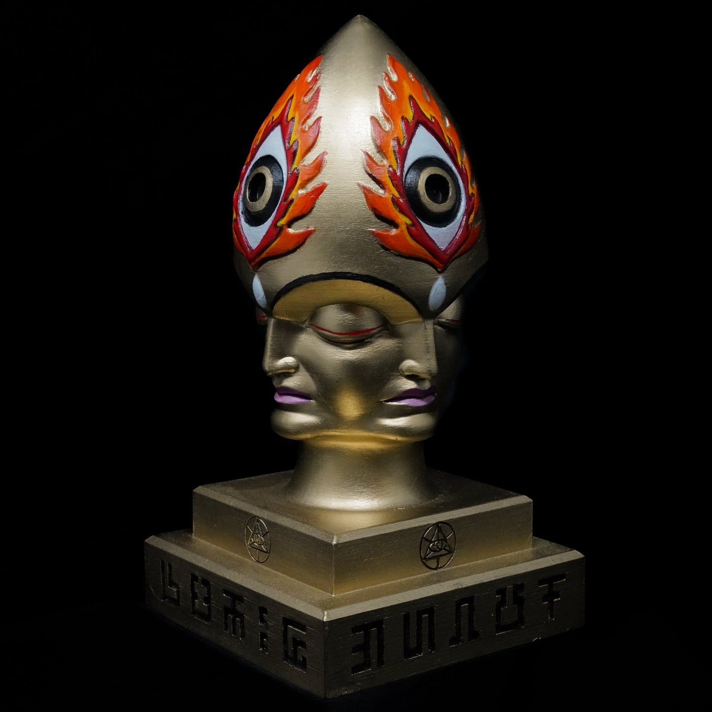 CoSM Shop Steeplehead sculpture, gold finish, double-faced head with eyes on headdress, limited edition signed by artists.