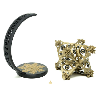 CoSM Shop Vision Crystal Prayer Wheel sculpture by Alex & Allyson Grey, gold with multiple eyes, on black stand with symbols.