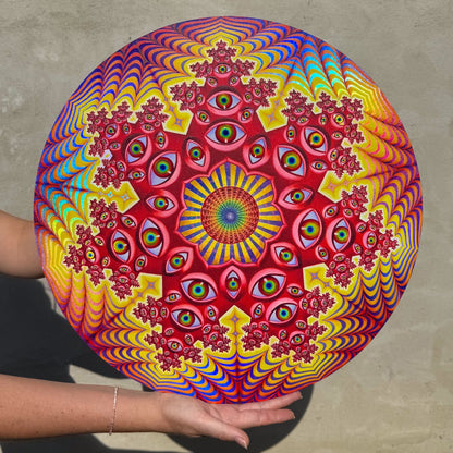 CoSM Shop Vision Crystal Tondo holographic textured metal print featuring eyes and fractal patterns in red, yellow, blue, and purple.