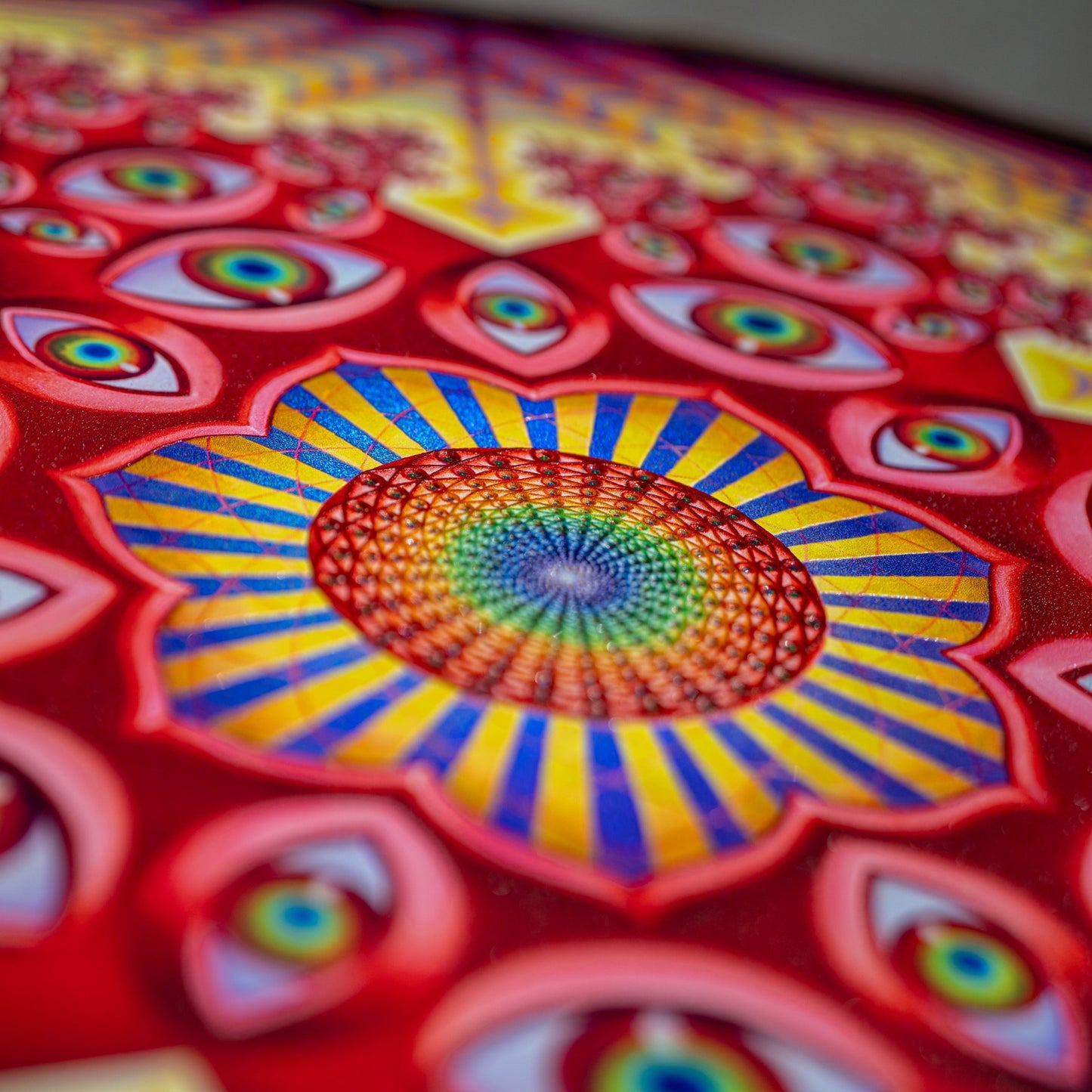 CoSM Shop Vision Crystal Tondo holographic textured metal print featuring eyes and a central rainbow mandala. Limited edition art.