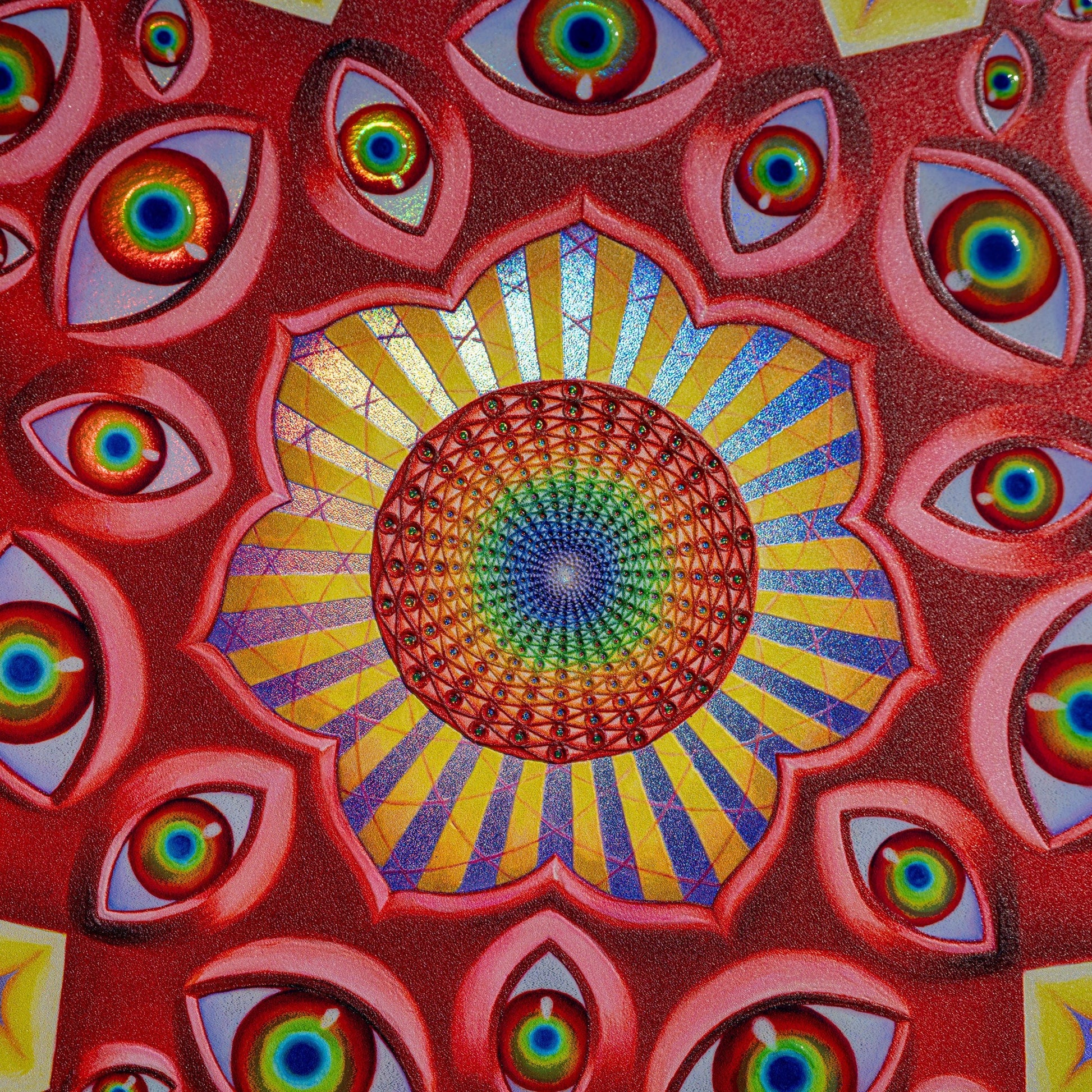CoSM Shop Vision Crystal Tondo holographic textured metal print featuring a central mandala of eyes and radiating sun rays, surrounded by multiple eyes on a red textured background.